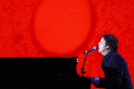  British singer Paul McCartney performs at the Brit Awards at Earls Court in London February 20, 2008.   