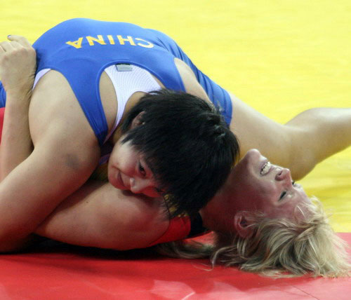 Photos: Wang Jiao advances to the 72kg final