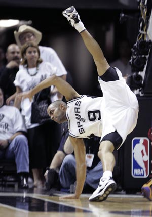 San Antonio Spurs guard Tony Parker falls on the court against the Los Angeles Lakers during Game 4 of their NBA Western Conference final basketball playoff series in San Antonio, Texas May 27, 2008.
