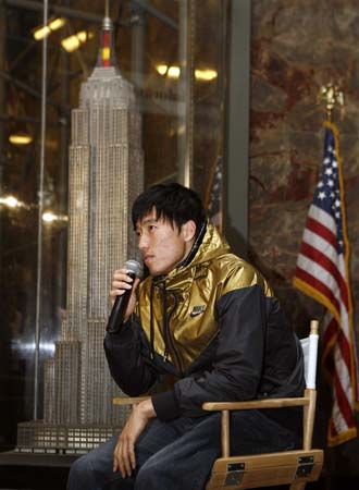 Liu Xiang, Chinese track and field star and Olympic gold medallist, speaks during a news conference at the Empire State Building in New York May 28, 2008.