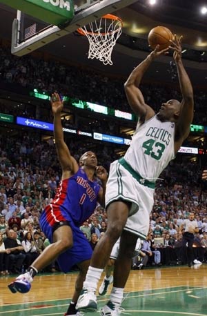 Celtics Kendrick Perkins (43) attempts a shot over Detroit Pistons Chauncey Billups (1) during third quarter of Game 5 of their NBA Eastern Conference Final basketball playoff series in Boston, Massachusetts May 28, 2008. 