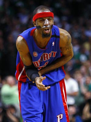 Detroit Pistons Richard Hamilton reacts to an injury during fourth quarter of Game 5 of their NBA Eastern Conference Final basketball playoff series in Boston, Massachusetts May 28, 2008.