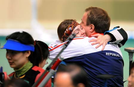 Photo: Katerina Emmons hugs her coach