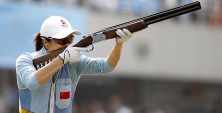 China's Wei Ning (L) competes during the women's skeet final in the 'Good Luck Beijing' 2008 ISSF World Cup at the Beijing Shooting Range CTF in Beijing, April 17, 2008. Wei Ning won the gold of the event with a score of 97 points.