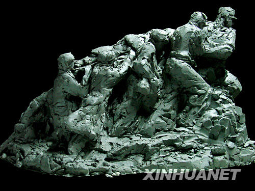 'China's Soul' is a sculpture work that features rescue workers carrying a quake victim on a stretcher, May 30, 2008. Yuan Xikun, a famous Chinese artist created three sculptures to highlight the heroism of the rescuers in quake relief.