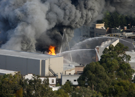 A fire rages out of control at the backlot filled with movie sets at Universal Studios in Universal City, California 12 miles from downtown Los Angeles June 1, 2008.