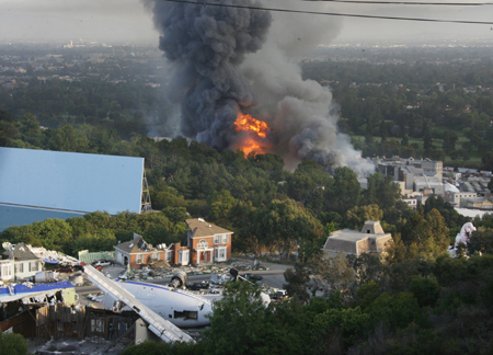A fire rages out of control at the backlot filled with movie sets at Universal Studios in Universal City, California, 12 miles from downtown Los Angeles June 1, 2008.