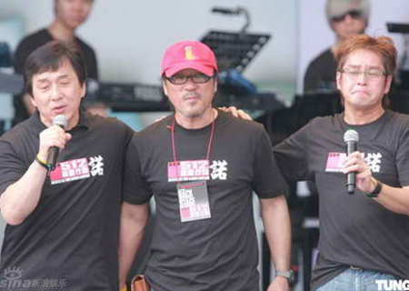 (From L to R)Jackie Chan, Li Zongsheng and Alan Tam perform at a fundraising concert in Hong Kong on Sunday, June 1, 2008.