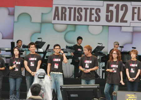 Stars perform at a fundraising concert in Hong Kong on Sunday, June 1, 2008.