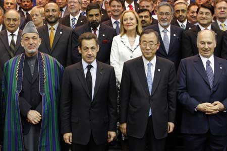 France's President Nicolas Sarkozy (2nd L) poses with U.N. Secretary-General Ban Ki-moon (2nd R), Afghanistan's President Hamid Karzai (L) and Aga Khan at the start of the international conference in support of Afghanistan at Kleber International Centre in Paris June 12, 2008. Ministers from dozens of countries gathered in Paris to pledge funds for Afghanistan and review their development strategy for the violence-plagued state.