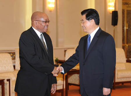 Chinese President Hu Jingtao (R) meets with Jacob Zuma, leader of the African National Congress of South Africa (ANC), in Beijing, capital of China, June        12, 2008.