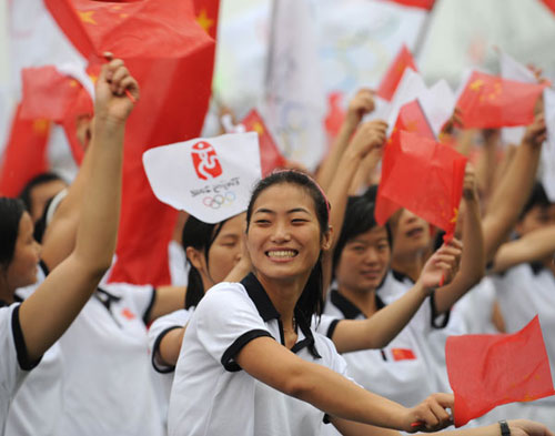 Photos: Well-wishers cheer along the relay route