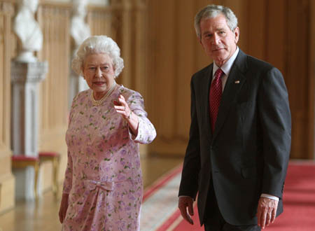 U.S. President George W. Bush walks with Britain's Queen Elizabeth in the St George's Hall, Windsor Castle, southern England June 15, 2008.