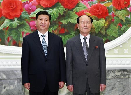Visiting Chinese Vice President Xi Jinping (L) meets with Kim Yong Nam, president of the Presidium of the Supreme People's Assembly of North Korea, in Pyongyang, capital of North Korea, June 17, 2008. (Xinhua/Pang Xinglei)