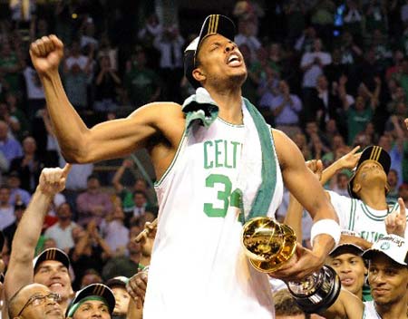 Boston Celtics' Paul Pierce, the finals MVP, celebrates with the trophy after Celtics won the NBA basketball championship with a 131-92 over the Los Angeles Lakers on Tuesday, June 17, 2008, in Boston.(Xinhua Photo)