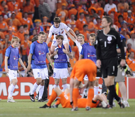 Russian players celebrate their victory over the Netherlands in the quarterfinal of the Euro 2008 Championships in Basel, Switzerland, on June 21, 2008. Russia won 3-1 and was qualified for the semifinal.