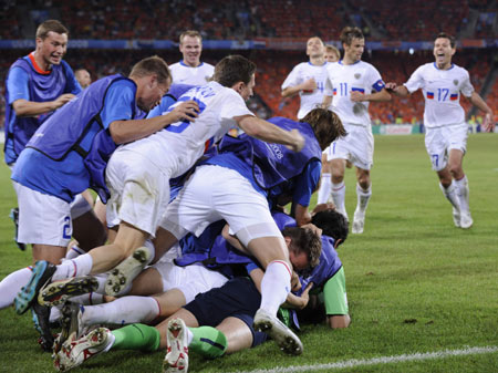Russian players celebrate the second goal in the quarterfinal against the Netherlands at the Euro 2008 Championships in Basel, Switzerland, on June 21, 2008. 