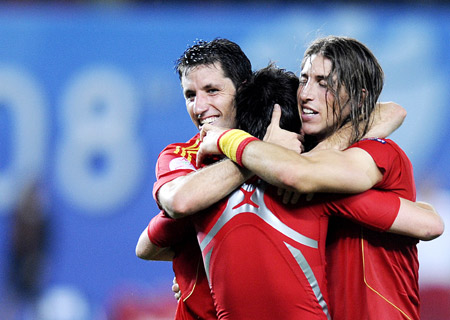 Spain's players celebrate their quarterfinal penalty shoot-out victory over Italy at the Euro 2008 Championships in Vienna, Austria, on June 22, 2008. 