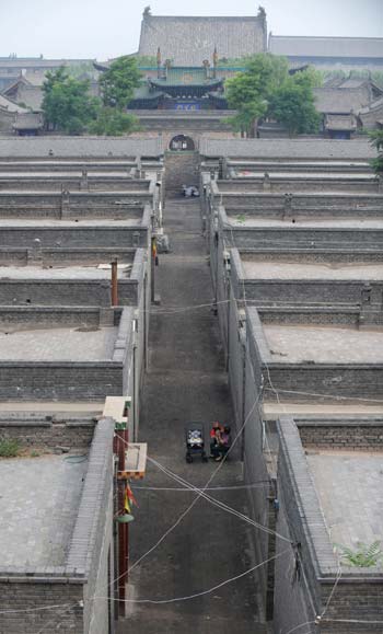 A bird's eye view of the Pingyao ancient city in North China's Shanxi Province. The Olympic flame will arrive at Pingyao on Wednesday.