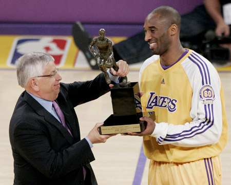 NBA Commissioner David Stern presents the 2007/2008 NBA Most Valuable Player Award to the Los Angeles Lakers Kobe Bryant before Game 2 of the NBA Western Conference semi-finals basketball series between the Lakers and the Utah Jazz in Los Angeles, California May 7, 2008. 