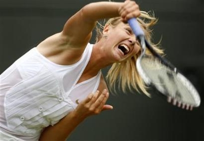 Maria Sharapova of Russia serves to Stephanie Foretz of France during their match at the Wimbledon championships in London June 24, 2008. (Reuters Photo)