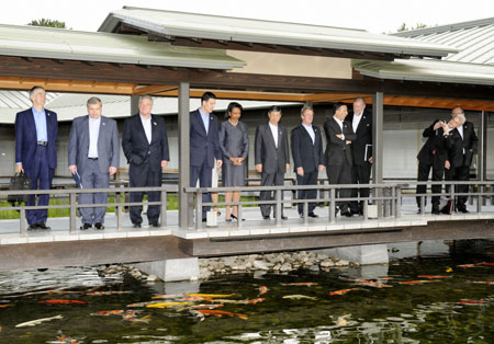 Participants of the G8 Foreign Ministers' Meeting pose for a photo before the opening of the two-day meeting in Kyoto, western Japan, on June 26, 2008. 