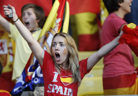 A Spanish fan cheers before the Euro 2008 championships final between Germany and Spain in Vienna, Austria, on June 29, 2008.
