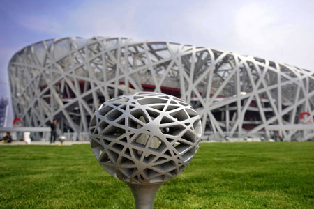 Photo taken on May 16, 2008 shows a light in the shape of the National Stadium. The National Stadium, also known as the bird's nest will be the main track and field stadium for the 2008 Summer Olympic Games and serves as venue to the Opening and Closing ceremonies of the games.
