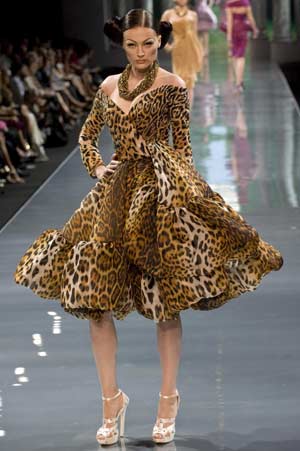 A model presents a creation as part of British designer John Galliano's Haute Couture Autumn-Winter 2008-2009 fashion show for French fashion house Dior in Paris, June 30, 2008.