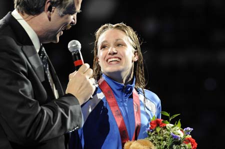 Katie Hoff (R) receives interview at the awarding ceremony for the Women's 400m Individual Medley at the U.S. Olympic Swimming Trials in Omaha of the United States, June 29, 2008.