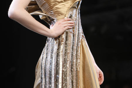 A model presents a creation by Lebanese designer Basil Soda during his haute couture autumn-winter 2008-2009 show in Paris July 1, 2008. 