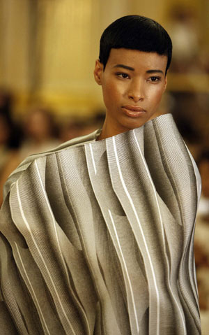 A model presents a creation by French designer Dominique Sirop as part of his haute couture autumn-winter 2008-2009 fashion show in Paris July 1, 2008. 