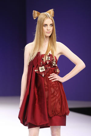 A model presents a creation by Lebanese designer Dany Atrache during his haute couture autumn-winter 2008-2009 show in Paris July 1, 2008.