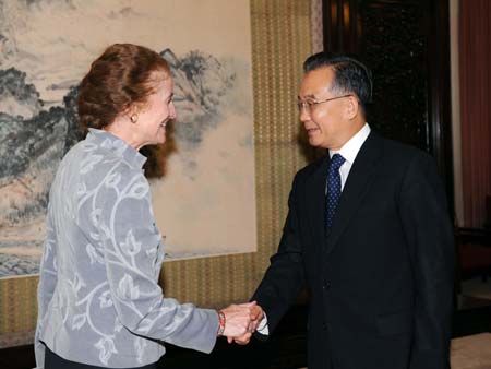 Chinese Premier Wen Jiabao (R) shakes hands with Henrietta Fore, administrator of the United States Agency for International Development (USAID) at Zhongnanhai in Beijing, July 2, 2008. (Xinhua Photo)