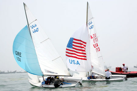 Foreign athletes practise for the Olympic sailing competition in Qingdao, Shandong Province July 6, 2008. With algae almost cleared, Olympic sailors begin to practise normally. 