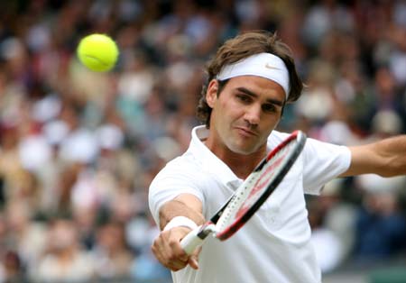 Roger Federer of Switzerland returns a shot during the men's singles final match against Spain's Rafael Nadal at the Wimbledon tennis tournament in London, capital of Britain, on July 6, 2008.
