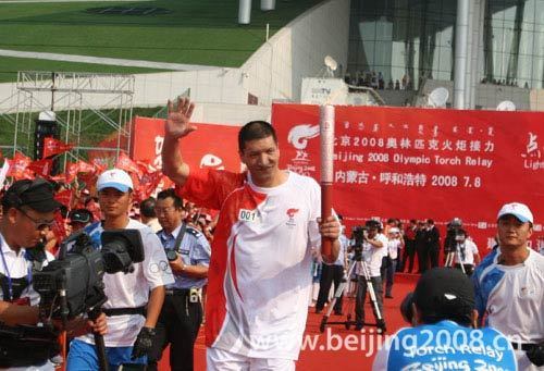 The first torchbearer Bateer carried the Olympic torch in Hohhot, Inner Mongolia on July 8.