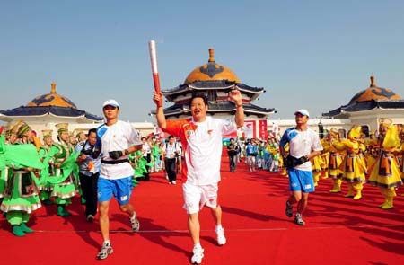 The Olympic torch relay starts in Ordos, Inner Mongolia Autonomous Region, on July 9, 2008. 