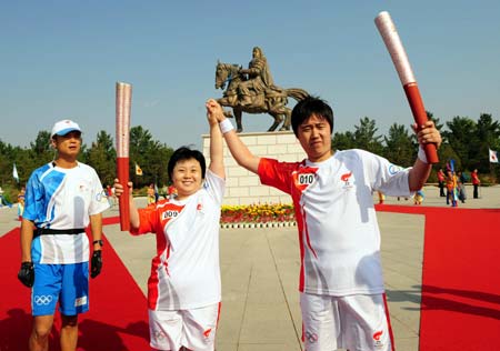 The Olympic torch relay starts in Ordos, Inner Mongolia Autonomous Region, on July 9, 2008.