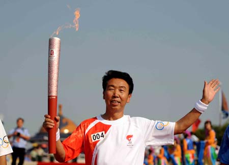 The Olympic torch relay starts in Ordos, Inner Mongolia Autonomous Region, on July 9, 2008.