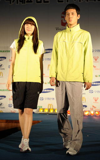 Models wear sporty outfits of the Korean Delegation to the Beijing Olympic Games, July 9, 2008.