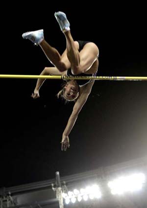 Yelena Isinbaeva of Russia jumps and sets a new world record in the women's pole vault during the Golden Gala IAAF Golden League at the Olympic stadium in Rome July 11, 2008.