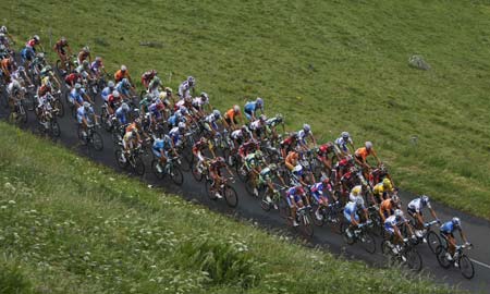 The pack of riders cycles during the seventh stage of the 95th Tour de France cycling race between Brioude and Aurillac July 11, 2008.