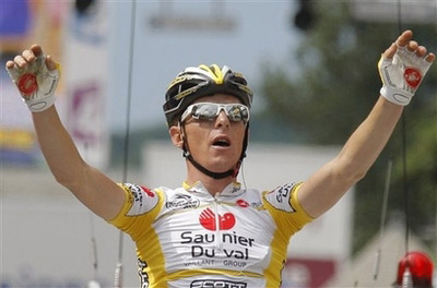 Riccardo Ricco of Italy reacts as he crosses the finish line to win the ninth stage of the Tour de France cycling race between Toulouse and Bagneres-de-Bigorre, southern France, Sunday July 13, 2008.(Xinhua/Reuters Photo)
