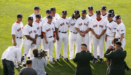 Boston Red Sox coaches and players pose for photos before Major League Baseball's All-Star game at Yankee Stadium in New York on July 15, 2008.(Xinhua/Reuters Photo)