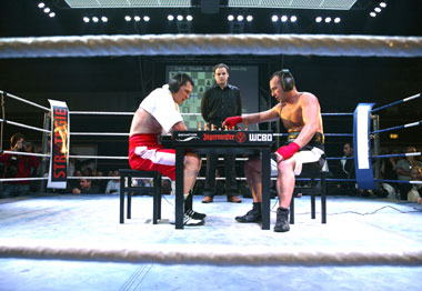 American David Depto (right) moves a piece during a chess boxing world championship against German Frank Stoldt in Berlin in this 2007 file picture. The sport combines chess and boxing in alternating rounds.