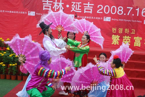 Wonderful dance performances are showcased at the ceremony during the Torch relay in Yanji, Jilin Province, on July 16, 2008.