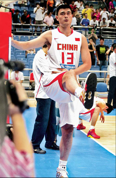 NBA star and Houston Rockets center Yao Ming warms up last night before playing his first game in almost five months after a foot surgery. He helped China beat Serbia 96-72 at the Stankovic Continental Cup in Hangzhou, Zhejiang province. Yao scored 11 points in 12 minutes. 