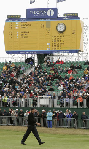 Greg Norman of Australia walks up the fairway to the green on the 18th hole during first round play at the 2008 British Open Golf Championship at Royal Birkdale, England July 17, 2008.