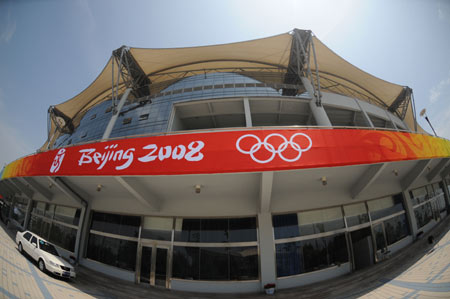 The photo taken on July 18, 2008 shows the exterior view of the Qinhuangdao Olympic Sports Center Stadium in Qinhuangdao, east China's Hebei Province. The Qinhuangdao Olympic Sports Center Stadium will host 12 football matches during the 2008 Beijing Olympic Games.